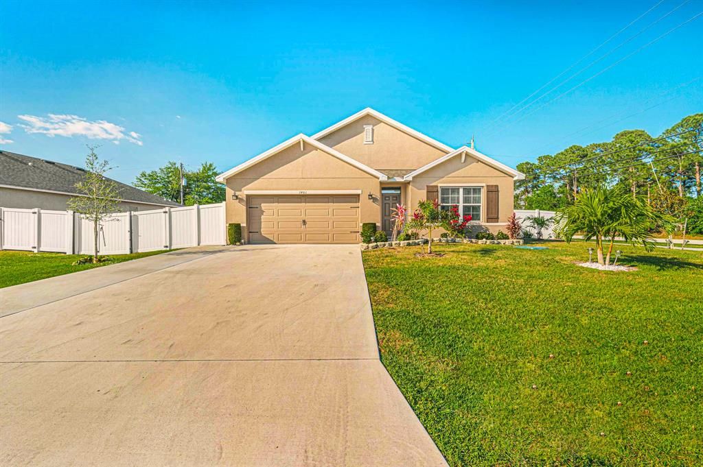 Photo of 1401 SW Bargello Avenue Avenue, Port Saint Lucie, FL 34953 (MLS # R10871795)