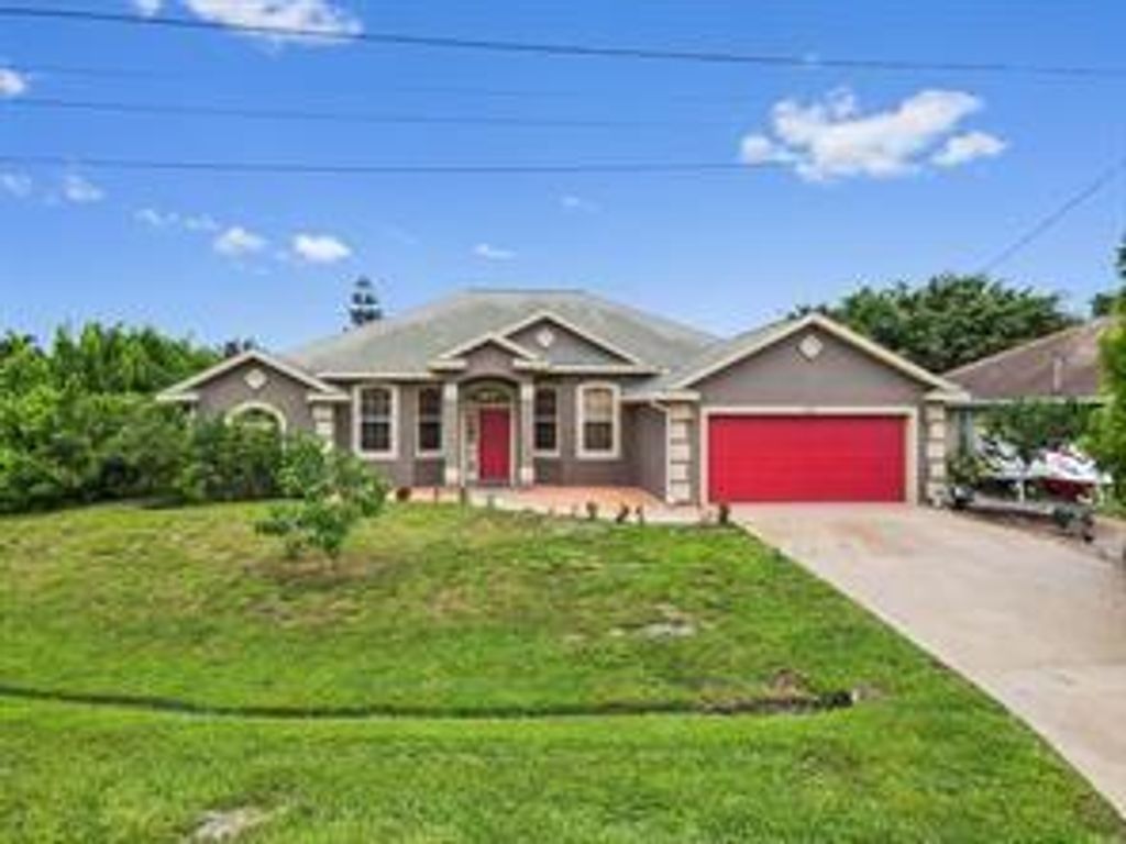 Photo of 602 SW Mccall Road, Port Saint Lucie, FL 34953 (MLS # F10473296)