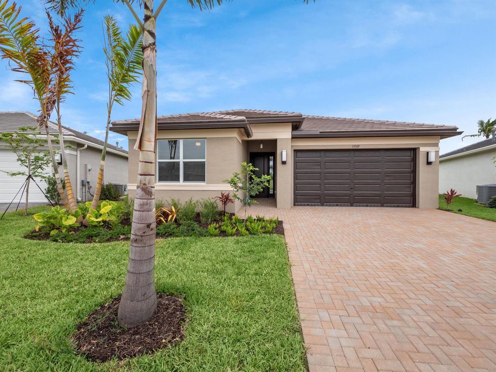 Photo of 13509 SW Oceanus Boulevard, Port Saint Lucie, FL 34987 (MLS # R10963275)