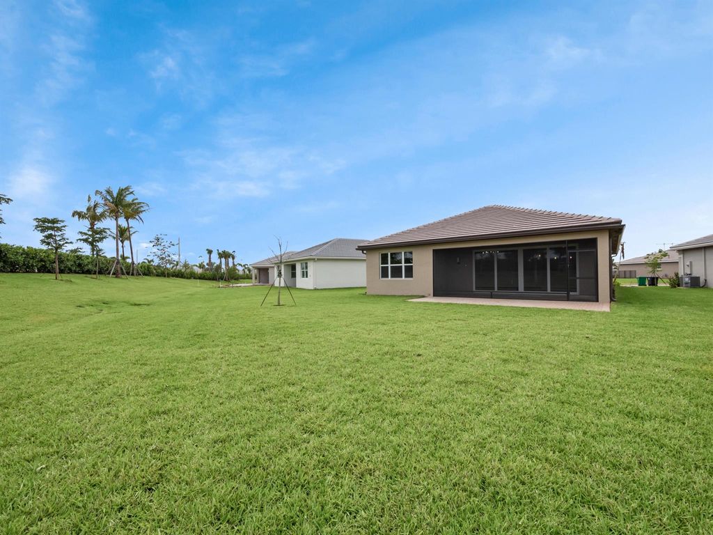 Photo of 13509 SW Oceanus Boulevard, Port Saint Lucie, FL 34987 (MLS # R10963275)