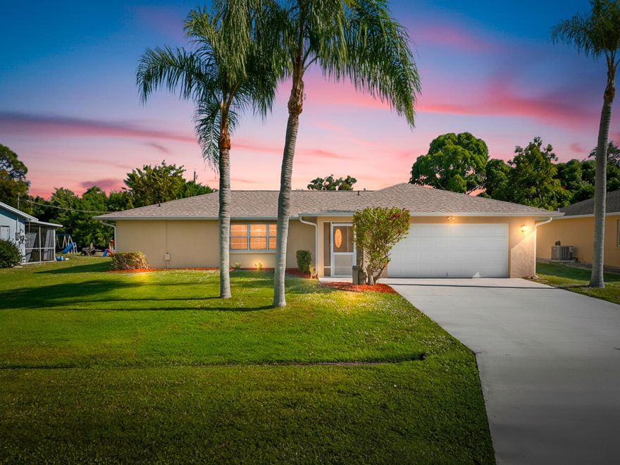Lovingly maintained, move-in-ready 3 bed/2 bath CBS home in a welcoming, established Port St. Lucie neighborhood! This home blends vintage charm with modern updates--featuring a brand new roof (2023), fresh paint inside & out, open living/dining concept, and a bright, spacious kitchen with tons of natural light and all appliances included. Relax or entertain year-round on the screened front entry or large, screened back porch overlooking a fully fenced backyard with mature landscaping--perfect for pets, play, or gardening!Enjoy peace of mind with sturdy CBS construction and city utilities, plus additional features: spacious bedrooms, functional bathrooms, storage/workshop in the garage, and true indoor-outdoor Florida living. Walk to parks, enjoy quick access to boat ramps & more!