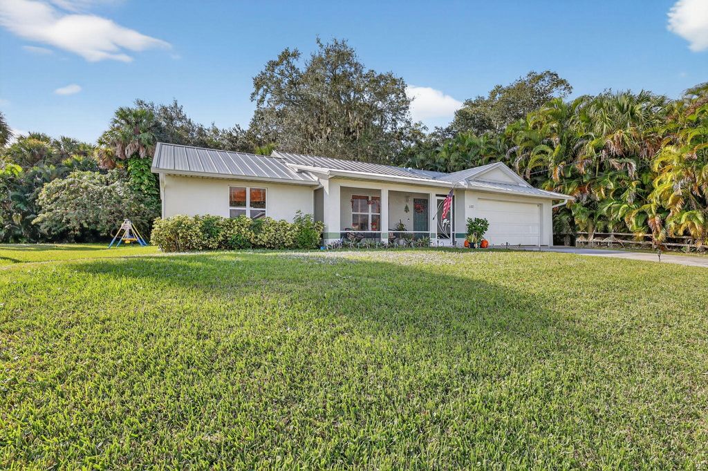 Photo of 1172 SW Ackard Avenue, Port Saint Lucie, FL 34953 (MLS # R11145450)