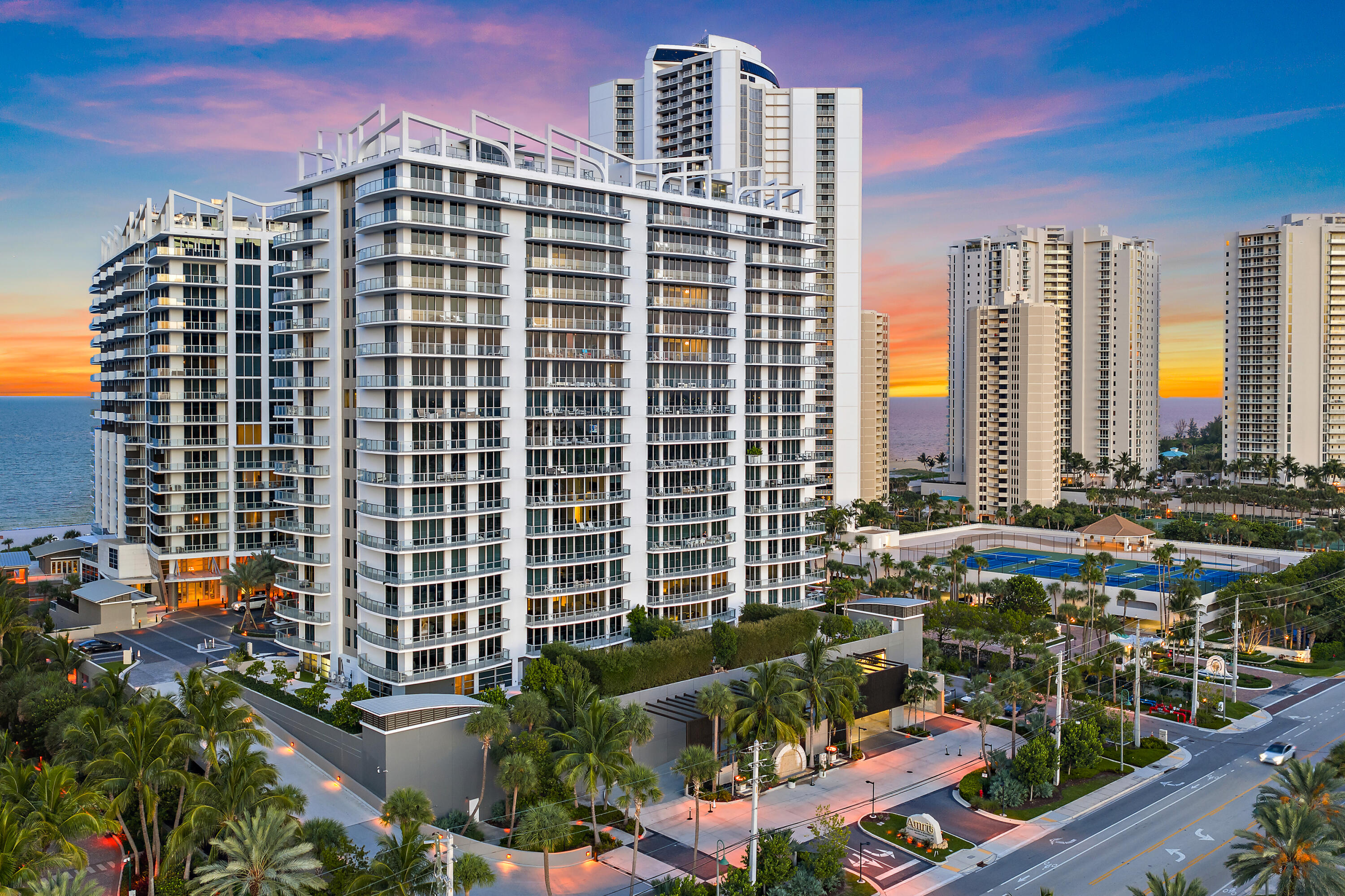 Elevated 17th-floor oceanfront residence offering panoramic southeast views of the Atlantic and Intracoastal, located in the prestigious Amrit Ocean Resort & Residences. This 2-bedroom, 2.5-bath home features 1,457 sq ft of thoughtfully designed interior space and a 360 sq ft wraparound terrace accessible from every room, delivering an unmatched indoor-outdoor living experience.