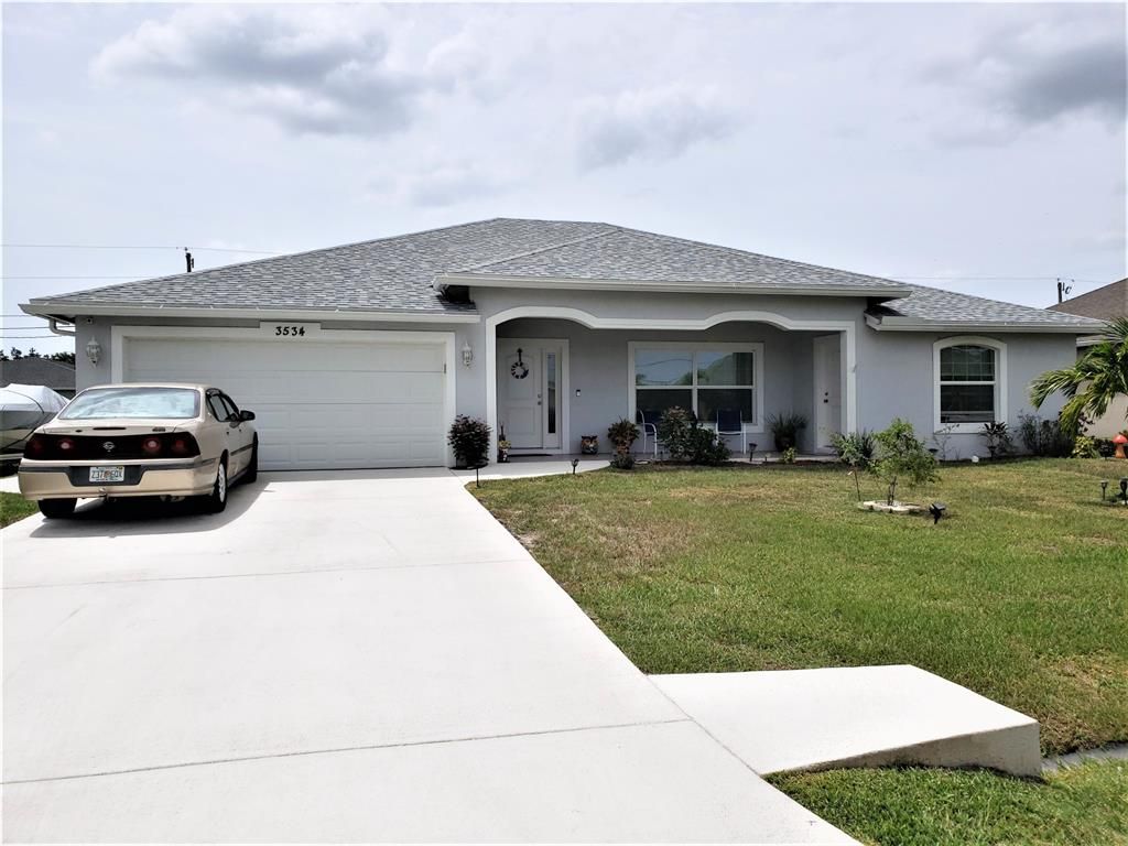 Photo of 3534 SW Viceroy Street, Port Saint Lucie, FL 34953 (MLS # R10742445)