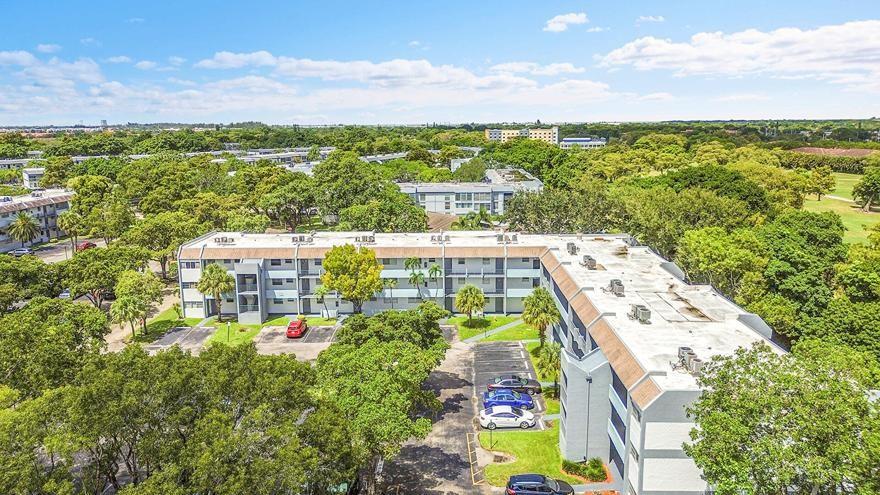 Immaculate and spacious 1BR/1.5BA apartment in a resort-style, all-ages community. This bright unit features a large living and dining area, oversized master bedroom with walk-in closet, and a full en-suite bath with tub. Includes a guest half bath, generous hallway storage, AC (2017), and a new water heater. Laundry and elevator are just steps from your door. Comes with one assigned parking spot, plenty of guest parking, and a private storage unit on the second floor.
