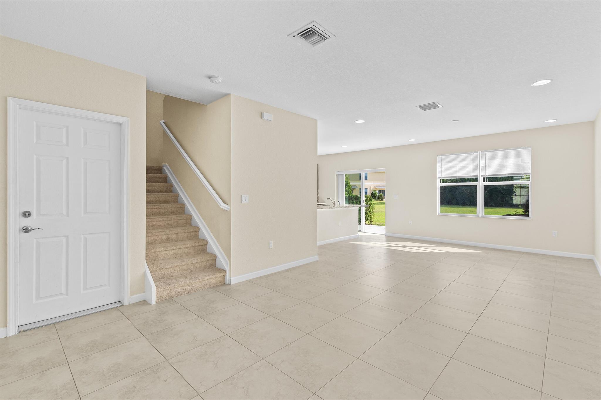 Better Than New! Spacious & Stylish Townhome in Vizcaya Falls Don't miss this incredible opportunity to own a beautifully maintained 3-bedroom, 2.5-bath townhome in the highly sought-after Vizcaya Falls community of St. Lucie West.Step inside to a bright and open main level featuring abundant natural light, modern tile flooring, and a spacious living and dining area perfect for entertaining. The gourmet granite kitchen is a true highlight, a center island, stainless steel appliances, and direct access to a private back patio overlooking a serene preserve--your perfect retreat for morning coffee or evening relaxation.Upstairs, you'll find three generously sized bedrooms and a laundry room with washer and dryer included. The luxurious primary suit