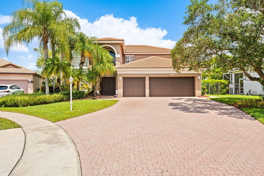 Amazing lakefront pool home tucked away on a quiet cul de sac lot, offering the space, style, & comfort today's buyers are looking for. Super desirable floor plan with the primary suite on the first floor, plus 4 bedrooms, 3 baths and a loft upstairs. Enter into the main living and dining areas w/soaring ceilings and expansive windows that fill the home w/natural light and flow seamlessly into the chef's kitchen featuring an island & breakfast bar overlooking the family room.  Designed for effortless Florida living, the outdoor space features an expanded screened-in patio, over-sized pool with sun shelf, fenced yard with room for pets and playsets  & peaceful long lake views.  A rare opportunity to enjoy indoor/ourdoor living while still being close to great parks, schools & shopping.. Boca Falls is a premier gated community w/ resort style amenities including a clubhouse, fitness center, playground, tennis, pickleball, basketball courts, & a community pool. Conveniently located near highly rated Waters Edge Elementary, Loggers Run Middle, & West Boca High, plus close to shopping & everyday conveniences. Ideally positioned next to South County Park w/ Osprey Point Golf Course, Amphitheater, Water Park, Dog Parks, playgrounds, tennis courts and more.
