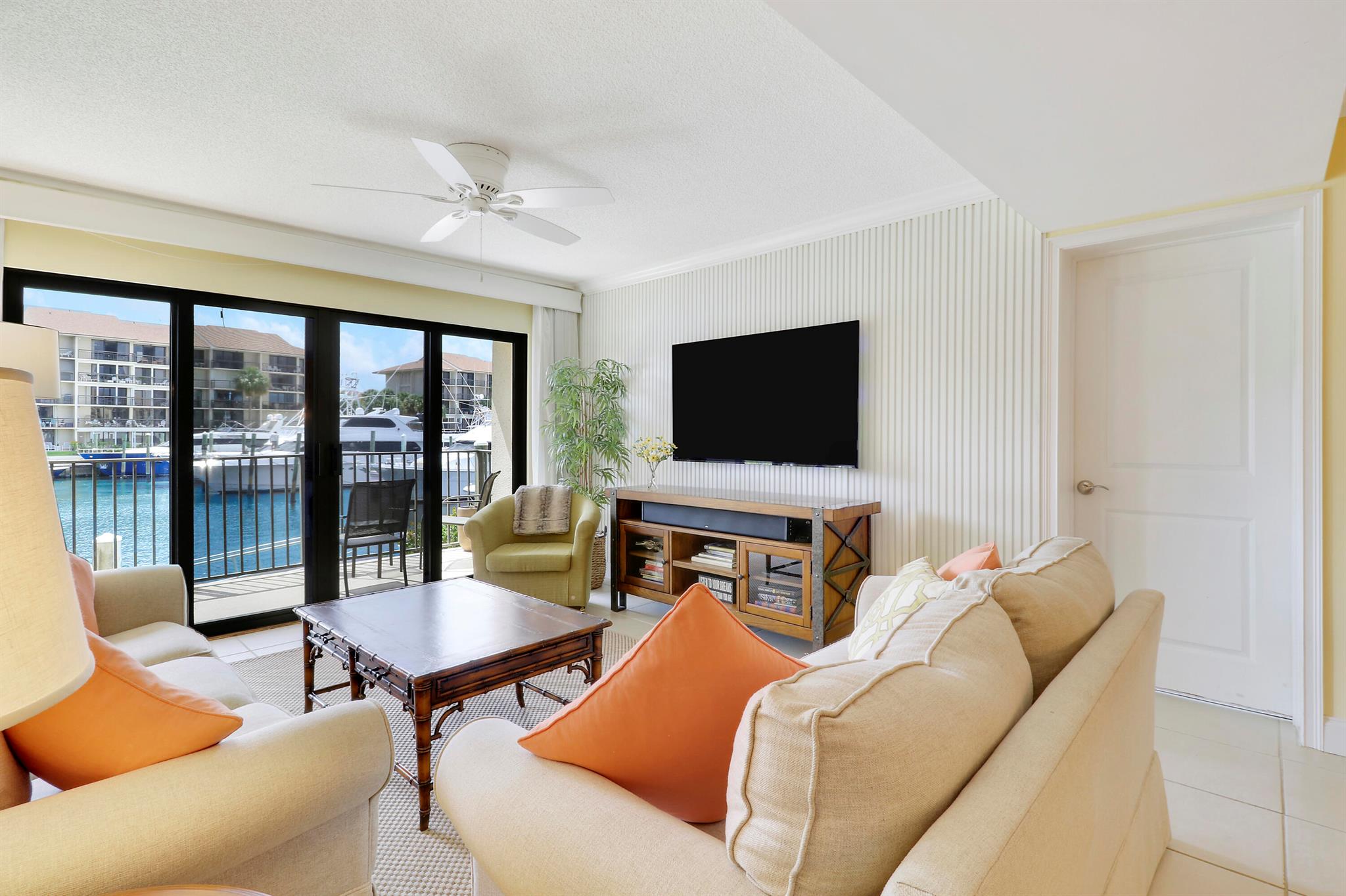 Beautifully updated 2/2 first floor Condo with Marina views located in the highly desirable Marina at the Bluffs community. Enjoy the best of coastal South Florida living just mins from Jupiter's pristine beaches, waterfront dining and boutique shopping. This well maintained unit features tasteful upgrades throughout, including impact glass windows and doors, an updated (2020)modern kitchen, modern baths(2021) and neutral finishes that make it move-in ready. The spacious layout includes a large living area and a private patio facing the marina and waterfront-perfect for relaxing after a day at the beach. Just steps away from scenic walking paths, marina views, and resort style amenities including pool, tennis and more. Live where others vacation!! Building A/C 2021, & Roofs 2022
