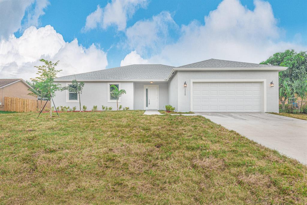Photo of 3141 SW Blackmur Street, Port Saint Lucie, FL 34953 (MLS # R10766090)