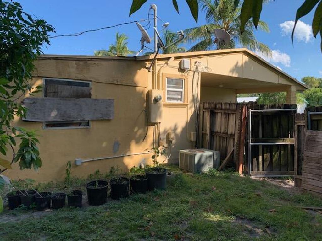 Photo of 1613 Paxton Avenue, Mangonia Park, FL 33407 (MLS # R10932181)