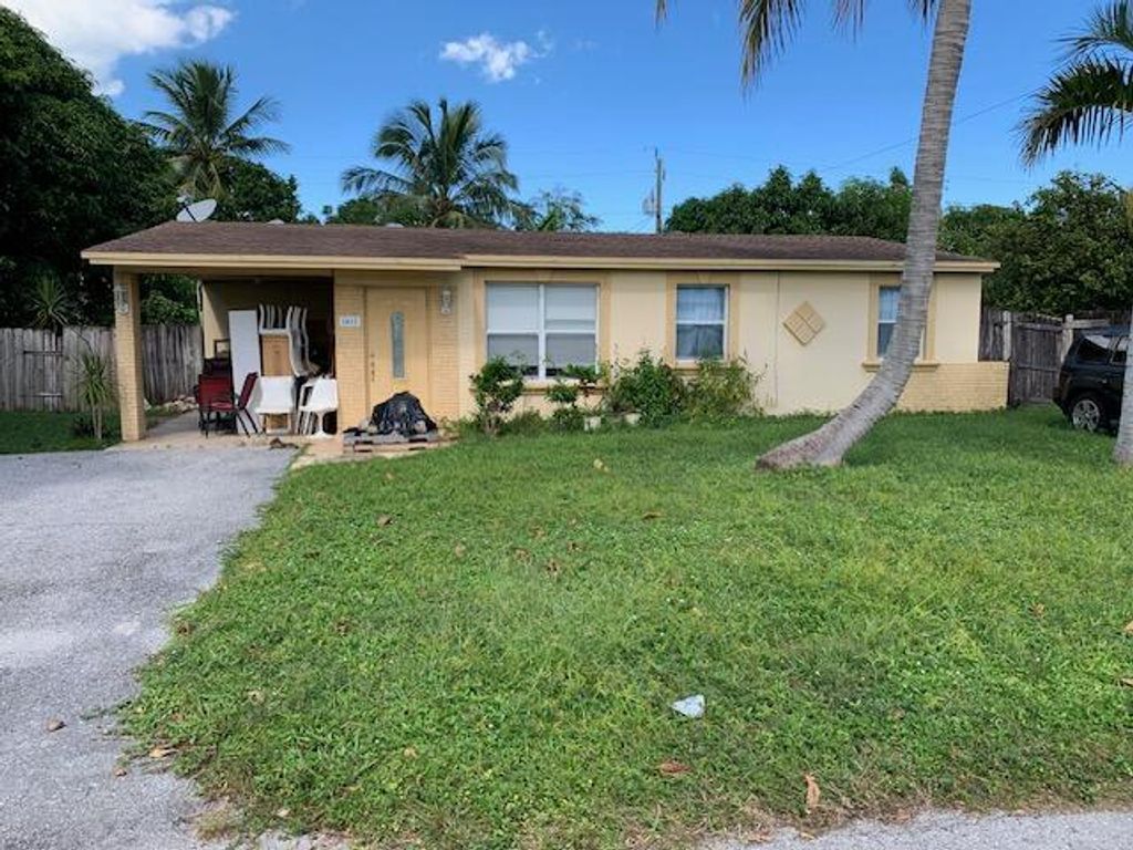 Photo of 1613 Paxton Avenue, Mangonia Park, FL 33407 (MLS # R10932181)