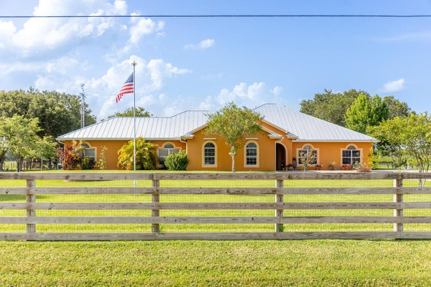 Spacious CBS home w/attached apartment. Total 3bd/3 1/2 ba, including 2 primary suites in the main home. Main primary bedroom has a walk in shower and separate jetted tub. Large kitchen, featuring a gas stove and stainless steel appliances, ample room for guests at the eat in bar. Not to mention a huge pantry room! Attached full size apartment adds the 3rd bedroom and 3rd bath, complete with its own kitchen and laundry room and private screened porch. Completely fenced yard with automatic gate. Whole house generator.Large metal building with separate a/c living area, perfect man cave!  Detached metal RV carport.  Perfect family home offering flexible living and great outdoor space.