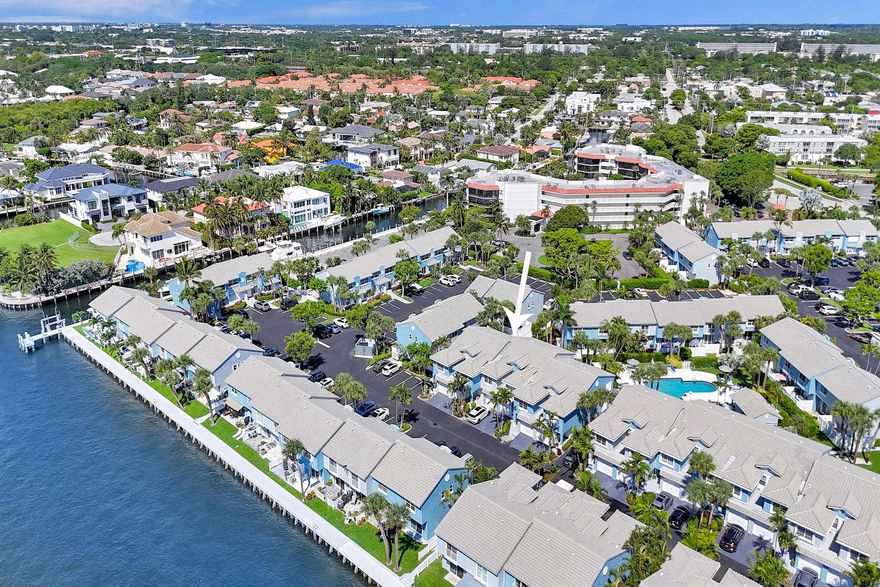 Outstanding 3-bedroom, 2.5-bath townhouse in beautiful Boca Quay--a gated waterfront community in East Boca Raton. This updated home features a newly remodeled kitchen with quartz countertops, white shaker cabinets, and stainless steel appliances, luxury vinyl flooring, 1-car garage, central A/C, and a private fenced patio. Enjoy community amenities including a heated pool, kayak racks/lift, picnic area and a scenic walking path along the Intracoastal waterway. Minutes to beaches, dining, and both downtown Boca as well as downtown Delray! Boca Schools , LOW HOA fees.