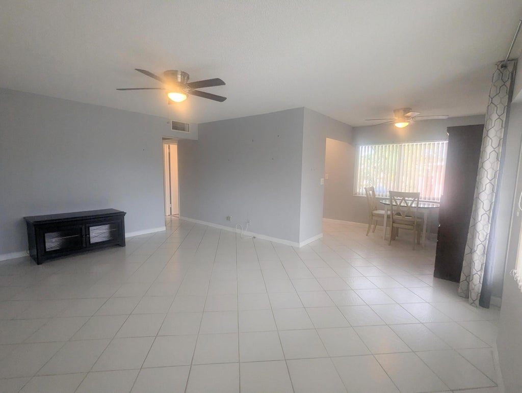 Photo of 100 KINGSWOOD E, West Palm Beach, FL 33417 (MLS # B26083966)