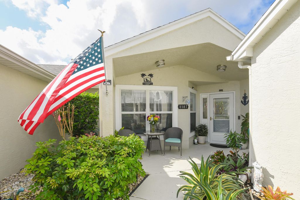 Photo of 1187 NW Lombardy Drive, Port Saint Lucie, FL 34986 (MLS # B26003440)