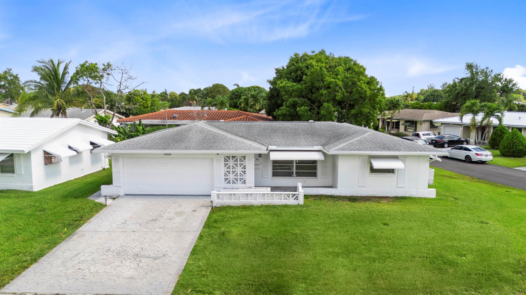 OPEN HOUSE 7/12 & 7/13 12-2:30. ALL AGES COMMUNITY! This corner lot home has been well maintained and has upgrades throughout offering one of the largest homes in the neighborhood at 1700 square feet as well as a 2 car garage. Enjoy updated flooring & bathrooms, an updated kitchen, freshly painted interior, walk-in closet in master, a beautiful Florida room and a bonus room that is currently being used as an office but can easily be converted into a 3rd bedroom. Situated across from the community park/pool makes this property convenient for any family. The low HOA covers lawn care & irrigation maintenance. The central location offers a variety of restaurants to choose from, as well as shopping/banking, the turnpike & sawgrass expressway around the corner. Schedule your showing today!