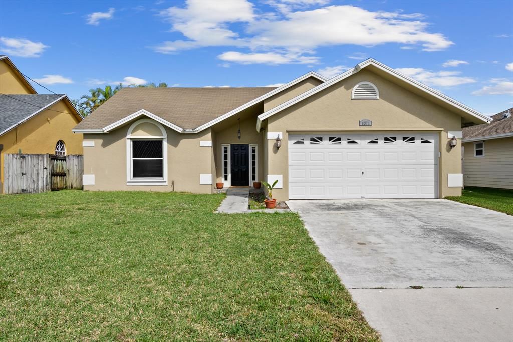 Photo of 6371 Barbara Street, Jupiter, FL 33458 (MLS # R10860336)