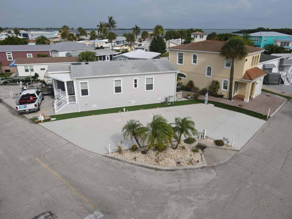 Photo of 485 NETTLES Boulevard, Jensen Beach, FL 34957 (MLS # B26064659)