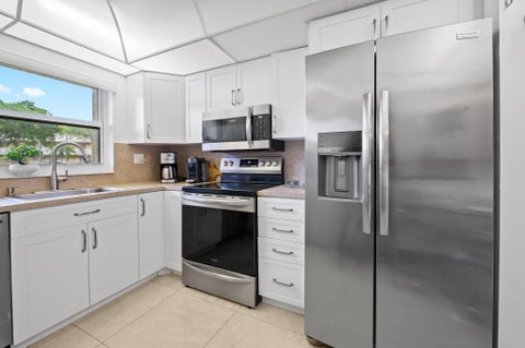 Photo of 9330 SUNRISE LAKES Boulevard #104, Sunrise, FL 33322 (MLS # B26088608)