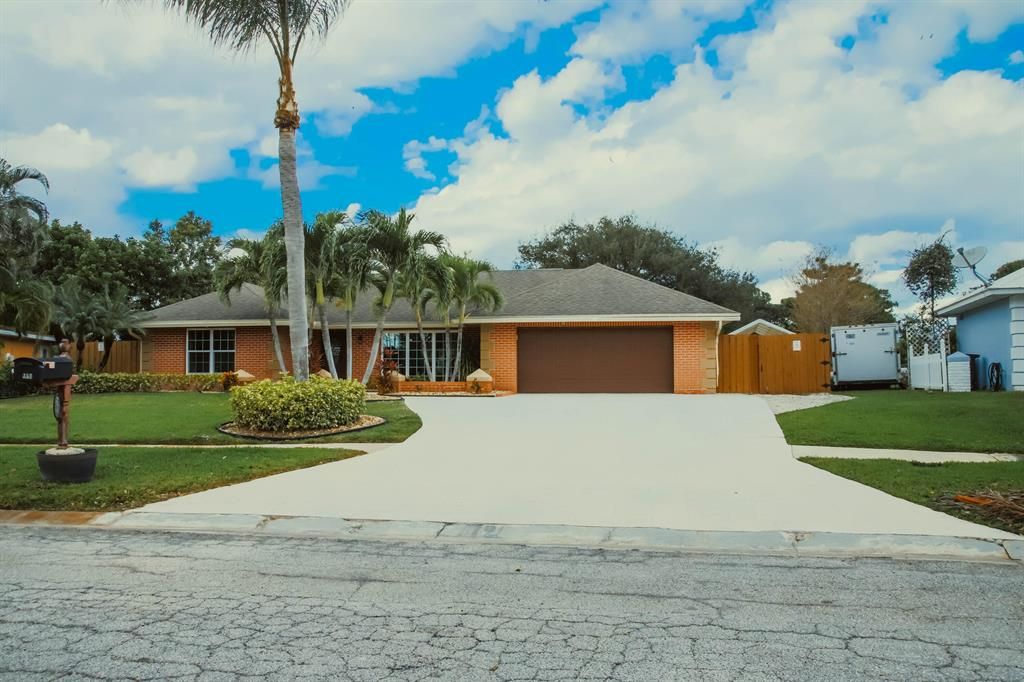 Photo of 357 NE Brasher Court, Port Saint Lucie, FL 34983 (MLS # R10769094)