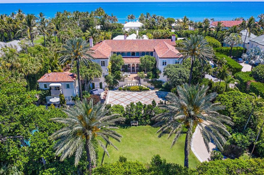 Thoughtfully renovated in 2018, this landmarked 1928 Marion Sims Wyeth compound sits high on a large lot (36,000+ SF) in Palm Beach's gracious Estate Section. The grounds are beautifully conceived for entertaining, privacy & ample outdoor enjoyment. The property enjoys deeded beach access & is conveniently located just two homes away from the Atlantic Ocean. The main house & separate guest house are surrounded by lush landscaping, affording beautiful garden views. The main house is a lovely representation of quintessential Marion Sims Wyeth elements: 25' ceiling living room with beautifully stenciled Pecky Cypress beams & an impressive coquina-clad fireplace, gracious first-floor gallery hall & second-floor gallery sitting room. Near Worth Avenue and Ocean beach access.