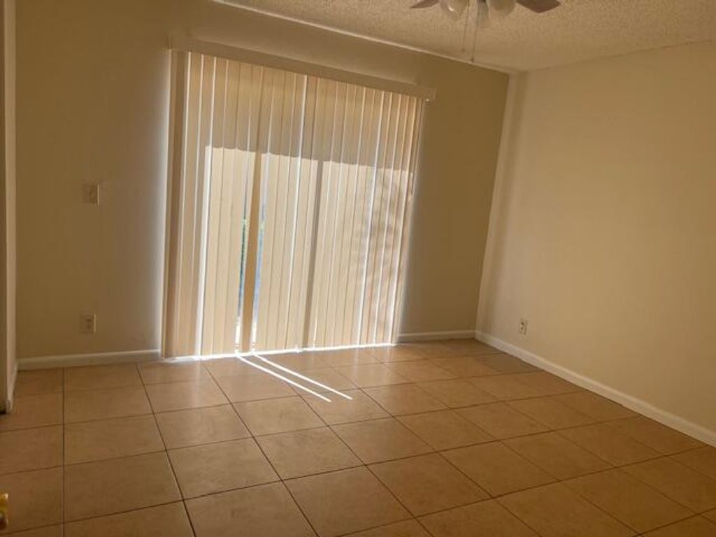 Photo of 10918 Royal Palm Boulevard #10918, Coral Springs, FL 33065 (MLS # B26018732)