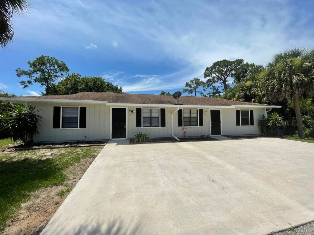 Photo of 1101 E Weatherbee Road Rd, Fort Pierce, FL 34982 (MLS # R10810193)