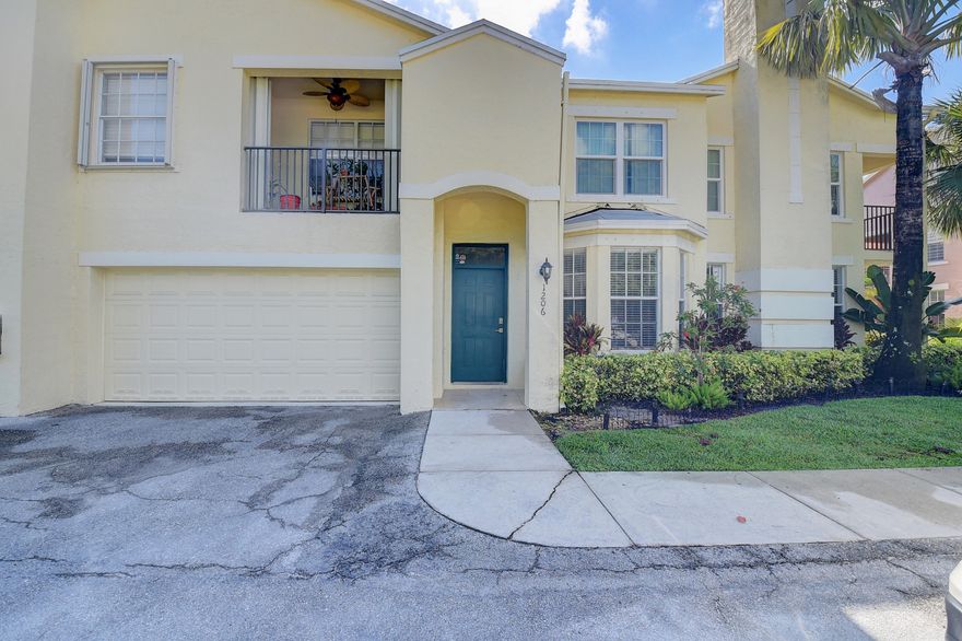 Available Now! Updated 2 bedroom, 2 bathroom coach home with a full 2 car garage available at the residences of Belmont Place. This unit features a split floorplan, each bedroom attached to its own bathroom. The kitchen is updated with stainless steel appliances and opens up to the large living room and dining room. This unit also features 2 separate covered balconies. The hallway includes a built in desk area that could serve well as a semi-private office space. There is also a separate laundry room in the unit equipped with a newer front loading washer and dryer. The master bedroom has a soaking tub and a separate walk in shower. All windows have been replaced with impact and a brand new A/C unit has just been installed. The two car garage has ample space to store all the toys. The unit has been freshly painted and cleaned, and available for immediate move-in. Quick and easy HOA approval. Two pets allowed up to 40lbs per association. The Residences at Belmont offers a community pool, clubhouse and playground. Water and trash included.