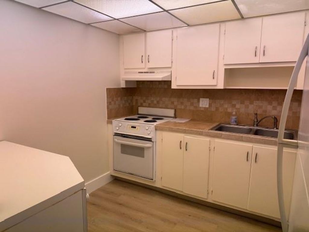 Photo of 2320 S Cypress Bend Drive #201, Pompano Beach, FL 33069 (MLS # F10524367)