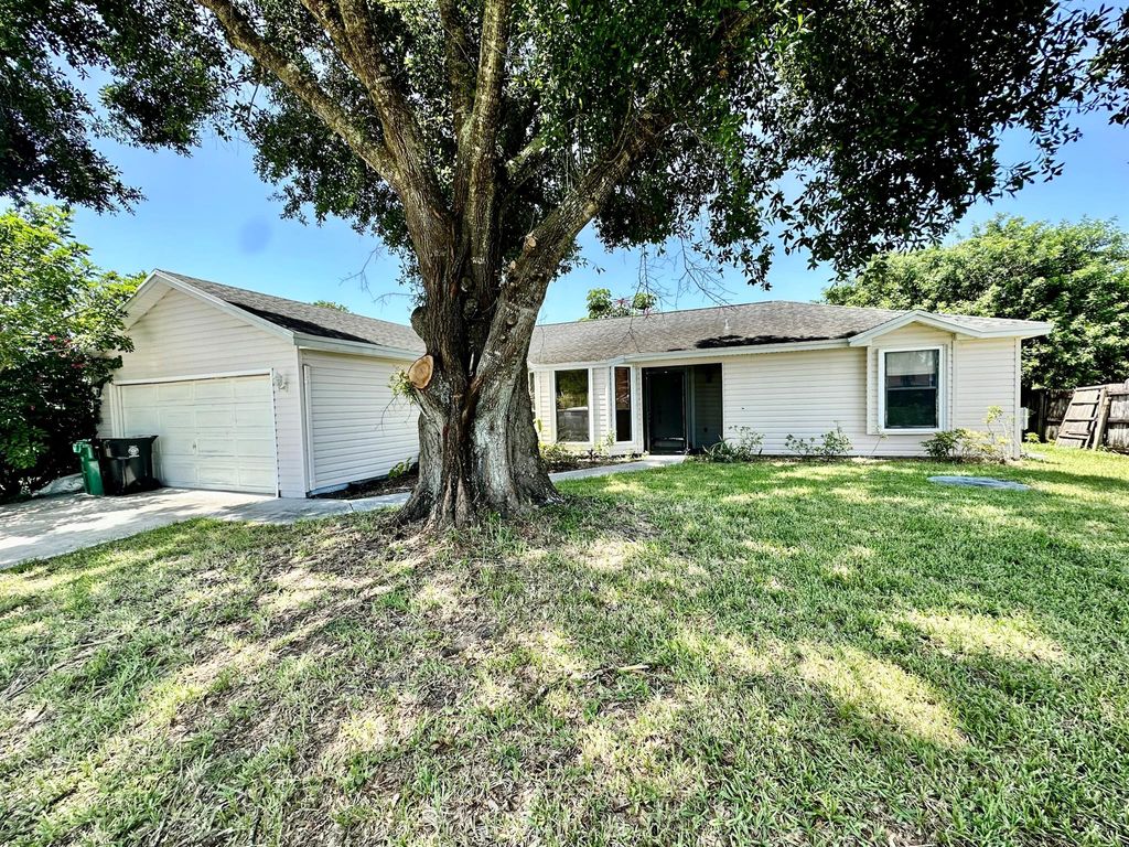 Photo of 1258 SW Cynthia Street, Port St Lucie, FL 34983 (MLS # R10910569)