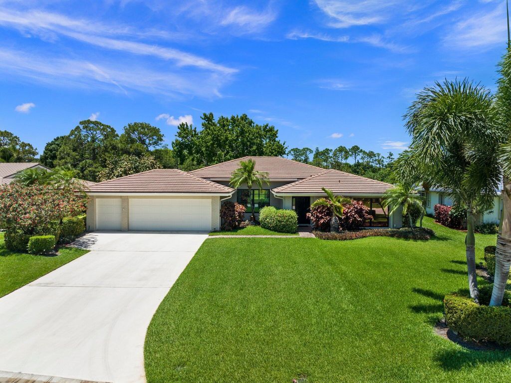 Photo of 2058 SW Heronwood Road, Palm City, FL 34990 (MLS # R10990630)