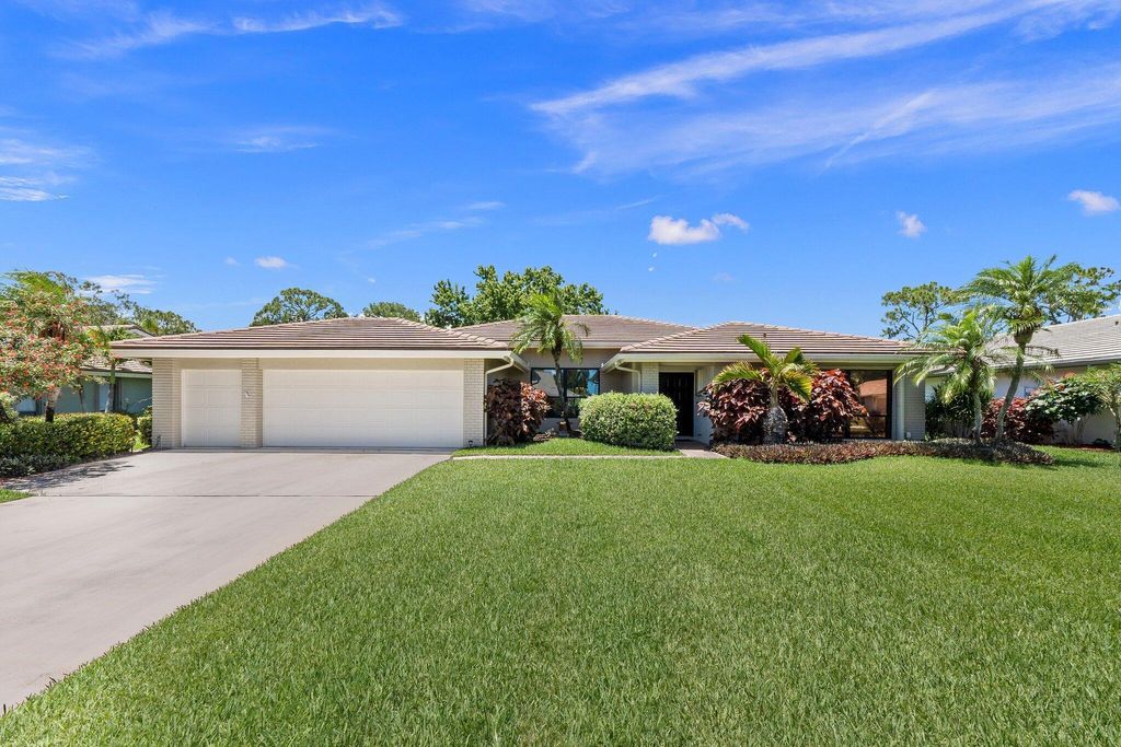 Photo of 2058 SW Heronwood Road, Palm City, FL 34990 (MLS # R10990630)