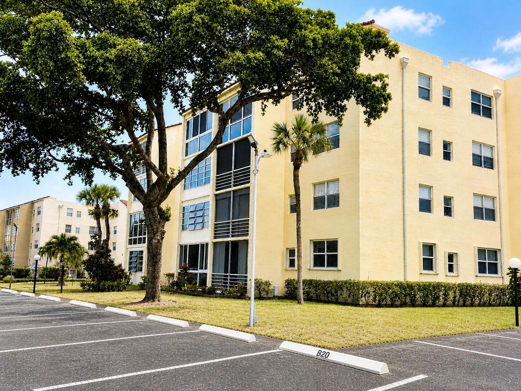 Photo of 2831 Somerset Drive #305, Lauderdale Lakes, FL 33311 (MLS # B26024371)