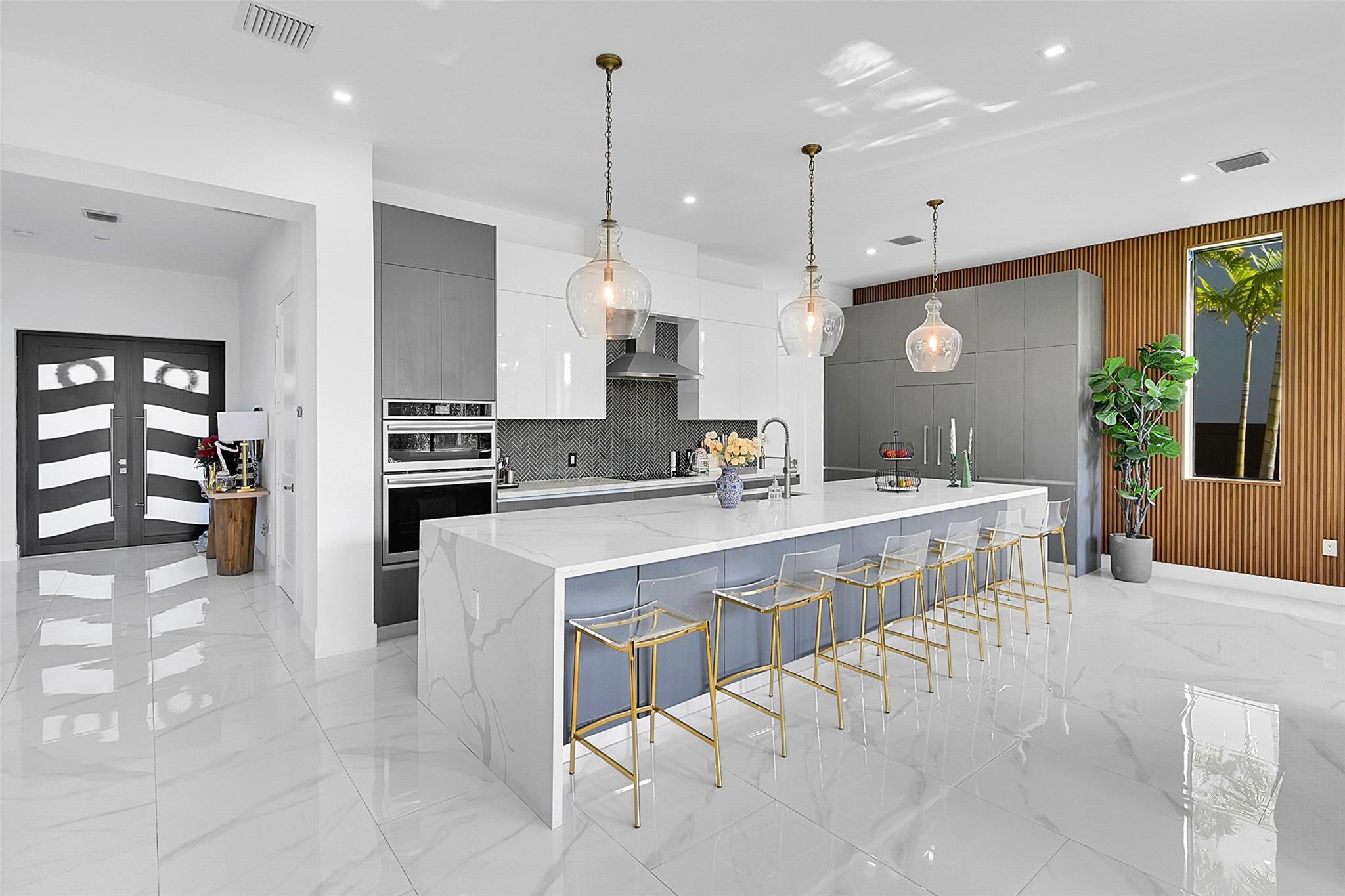Discover this brand-new construction property at The Oaks of Davie, 4/4 home that embodies true luxury. Situated on a corner lot, this masterpiece features a full bed & bath on the 1st floor w/a spacious 2car garage, & an exquisite laundry room fit for royalty. The home boasts over $200,000 in custom upgrades throughout, including a chef's dream kitchen. Enjoy an open layout w/ample natural light, sophisticated porcelain floor tiles, & impact-resistant doors & windows. Located near I-570, I-75, Sawgrass Mills Mall, top-rated schools, restaurants, & parks, this home is perfect for families. His & her closets are truly amazing—search no further if you desire the most fantastic closets ever. Extensive patio offers potential for a pool (virtually staged), enhancing it's appeal for entertaining