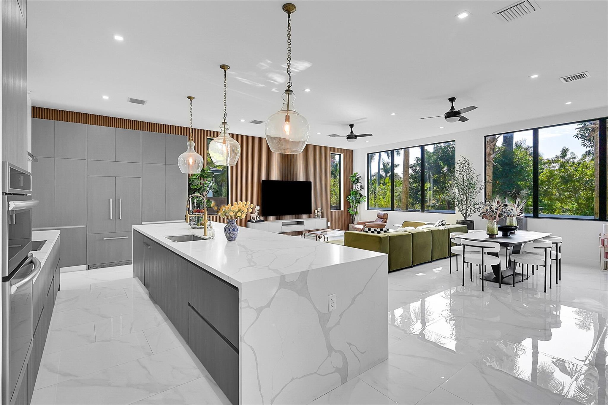 Discover this brand-new construction property at The Oaks of Davie, 4/4 home that embodies true luxury. Situated on a corner lot, this masterpiece features a full bed & bath on the 1st floor w/a spacious 2car garage, & an exquisite laundry room fit for royalty. The home boasts over $200,000 in custom upgrades throughout, including a chef's dream kitchen. Enjoy an open layout w/ample natural light, sophisticated porcelain floor tiles, & impact-resistant doors & windows. Located near I-570, I-75, Sawgrass Mills Mall, top-rated schools, restaurants, & parks, this home is perfect for families. His & her closets are truly amazing—search no further if you desire the most fantastic closets ever. Extensive patio offers potential for a pool (virtually staged), enhancing it's appeal for entertaining