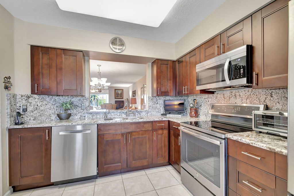Photo of 12560 Majesty Circle #401, Boynton Beach, FL 33437 (MLS # R11056076)