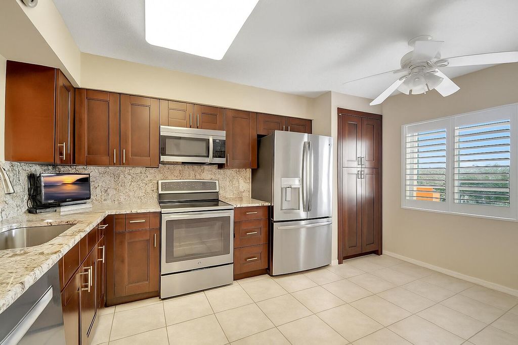Photo of 12560 Majesty Circle #401, Boynton Beach, FL 33437 (MLS # R11056076)