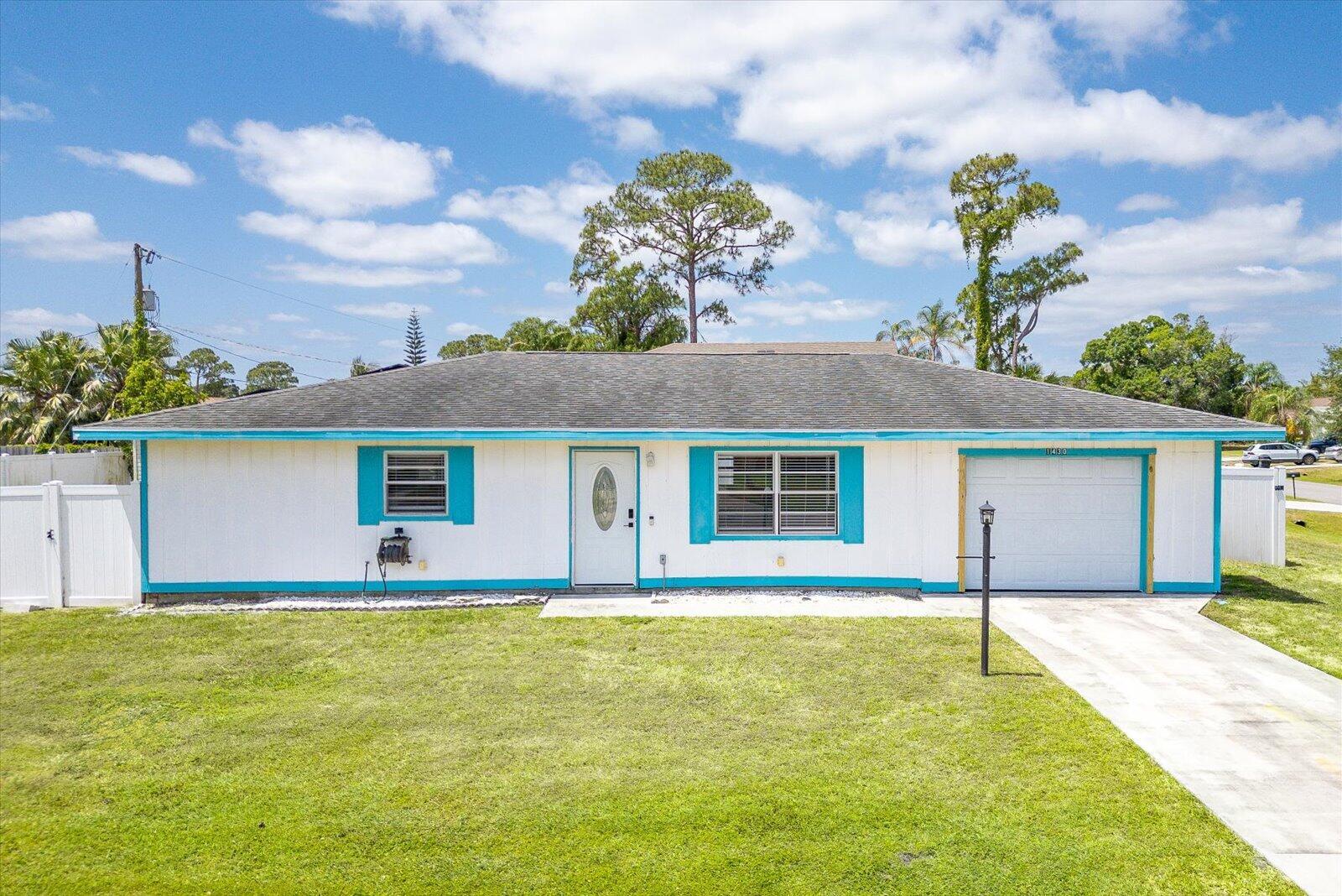 Welcome to this well-maintained 2-bedroom, 2-bath home situated on a spacious corner lot. Enjoy the light and bright interior featuring tile flooring throughout. The home includes a Florida room, perfect for additional living or entertaining space. Both bedrooms have walk in closets for plenty of storage.The backyard is generously sized and fenced in, perfect for pets, and includes a storage shed for tools and equipment.Additional highlights include a whole-home water treatment system, ensuring high-quality water throughout the residence, and a brand new roof in the works! Just minutes away from The Landing at Tradition and Tradition Village and approximately 10 miles from the pristine beaches of Hutchinson Island.