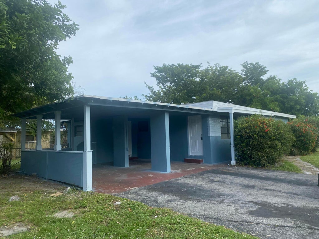 Photo of 3015 SW 2ND Street, Fort Lauderdale, FL 33312 (MLS # B26079921)