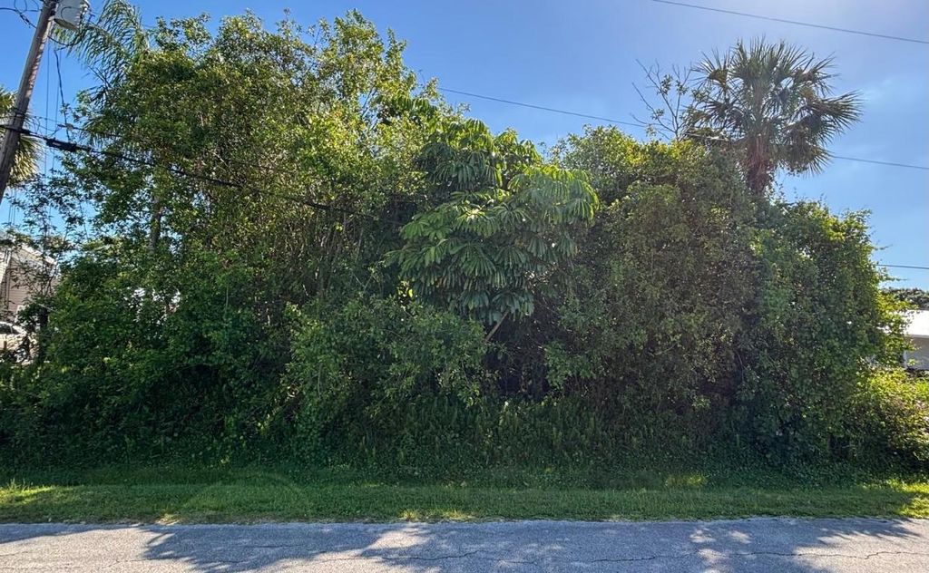 Photo of 5808 Bamboo Drive, Fort Pierce, FL 34982 (MLS # R11081909)