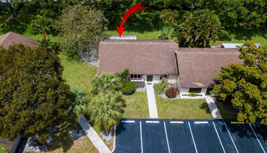 Photo of 65 Via De Casas Norte, Boynton Beach, FL 33426 (MLS # R10972321)