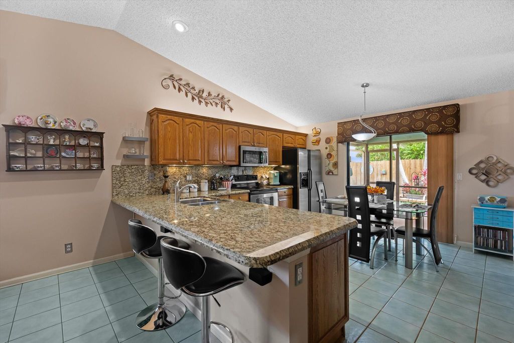 Photo of 141 Roycourt Circle, Royal Palm Beach, FL 33411 (MLS # R11087686)