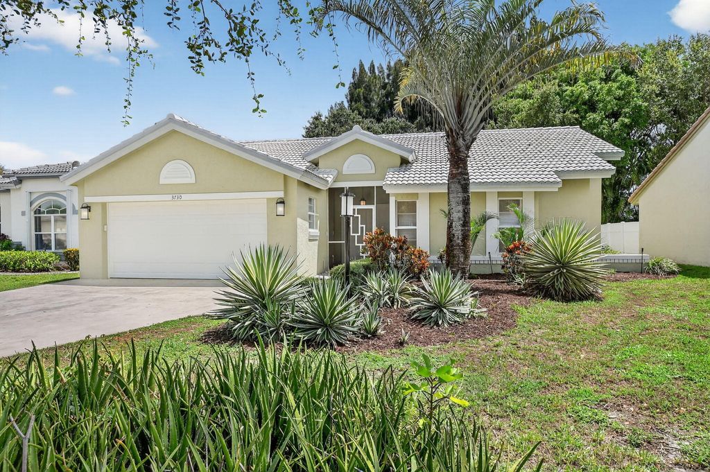 Photo of 3730 Green Cypress Way, Lake Worth, FL 33467 (MLS # B26029696)