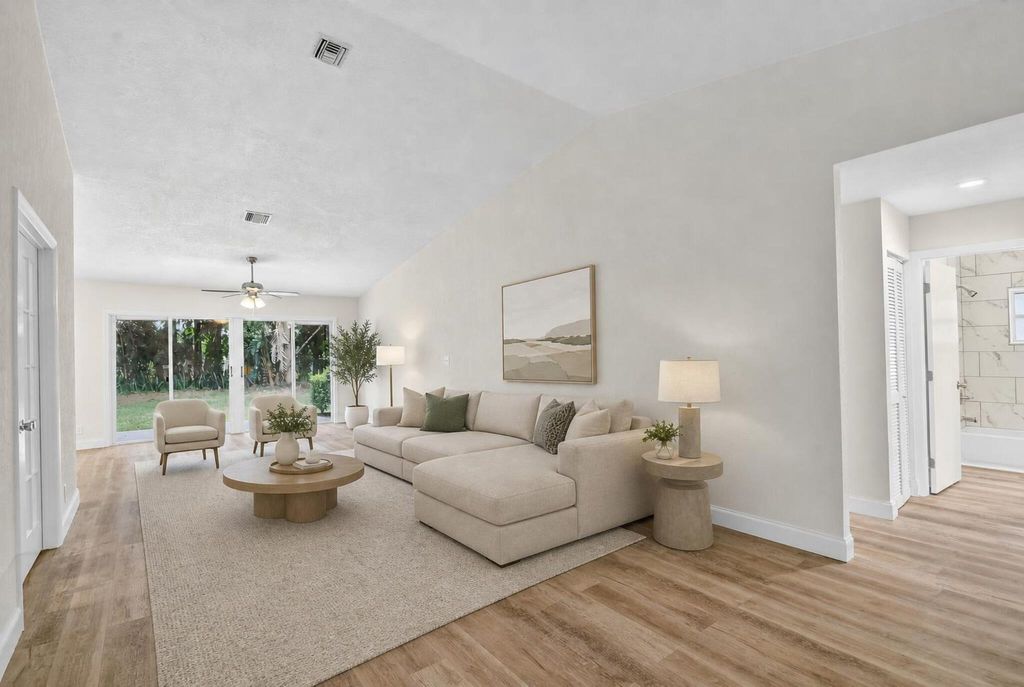 Photo of 3730 Green Cypress Way, Lake Worth, FL 33467 (MLS # B26029696)