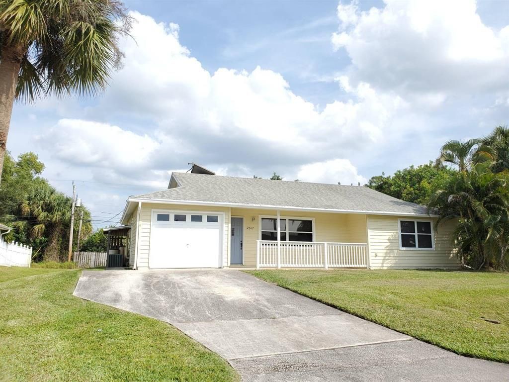 Photo of 2317 SW Norton Street, Port Saint Lucie, FL 34953 (MLS # R10737675)