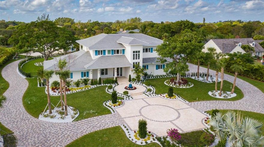 This sprawling contemporary new construction project offers 2 estate homes with approx 10,000sf of luxury living space under air and is located on a 2 acre parcel in the heart of Palm Beach Gardens. No detail has been left out in this custom built one of a kind offering. Centrally located in the private Horseshoe Acres development, the main house offers 6 BR's, study, family and living rooms, soaring ceilings and world class finishings. A professionally-equipped gourmet kitchen is the centerpiece of the main house that opens to the huge covered porch and tropical pool setting. The guest house has 4 BR's and it's own private pool and is perfect for the family or used as a home office. There is nothing like this property on the market today and is a must see!