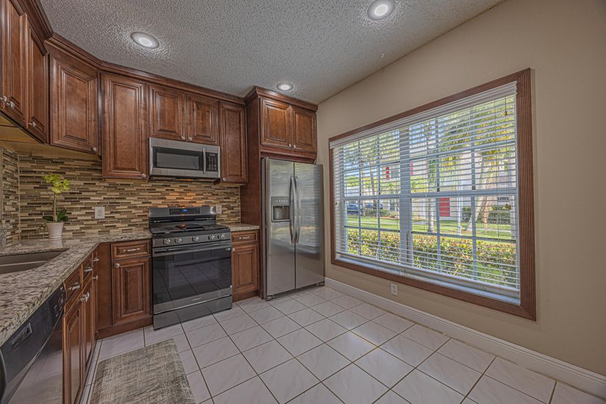 Absolutely Beautiful!  Location, Location, Location!  The community of Captiva is conveniently located near delightful parks, shopping centers, the Sawgrass mall, Sawgrass expressway, worship centers and so much more.  This elegant townhouse includes 2 beds, 2 and 1/2 baths and offers a one car garage, screened patio which includes sunshades, spacious kitchen with stainless steel appliances, a gas range with "bells and whistles" including air fryer; and space for an eat-in kitchen. The spacious owner's suite with its walk-in closet and owner's bathroom is located upstairs of the home.  The guest bedroom also offers a large closet and private Enjoy resort style amenities and a warm and inviting community.