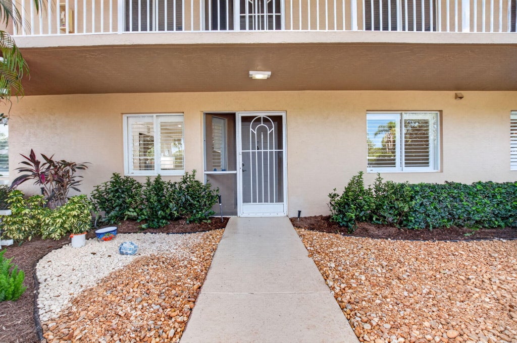 Photo of 5914 REGAL GLEN Drive #107, Boynton Beach, FL 33437 (MLS # B26088481)