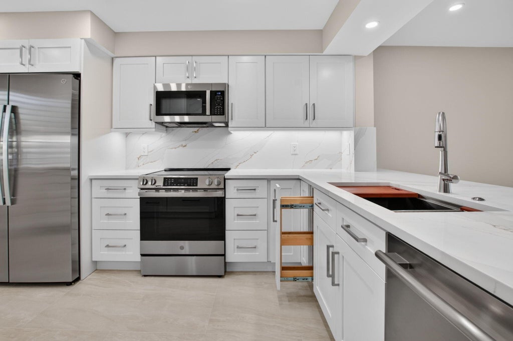 Photo of 5914 REGAL GLEN Drive #107, Boynton Beach, FL 33437 (MLS # B26088481)