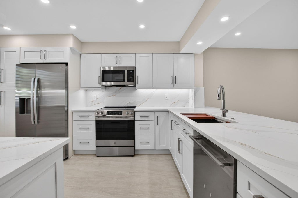 Photo of 5914 REGAL GLEN Drive #107, Boynton Beach, FL 33437 (MLS # B26088481)